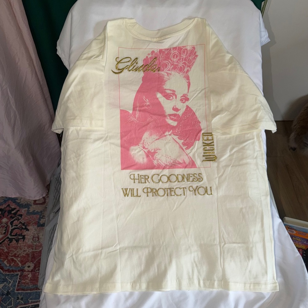 Wicked Glinda Ariana Grande Graphic Tee Gold Glitter Pink Cream Small NWT